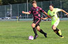Jack Parker of FC Tuxpan(left) being followed by Danny Salazar of Maidstone Market