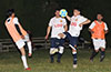 Santiago Solis of Liga de Gulag about to head the ball