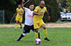 Alejandro Landeros of FC Tuxpan(front) just too fast for Christian Solis