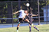 Gehider Garcia of Maidstone Market(left) heading the ball with a Liga de Gulag defender