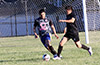 Two Liga de Gulag players going for the ball