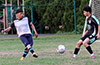 Flavio Ayavaca of Liga de Gulag(left) hitting the ball past Arial Garcia of Maidstone Market